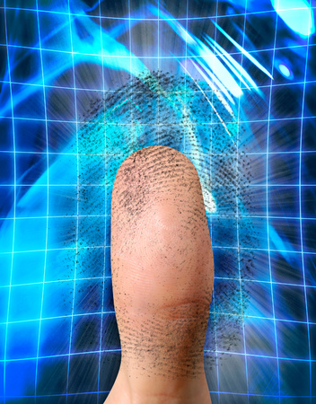 Close-up of a fingerprint and a thumb conceptual photo-illustration. Biometric identification, security, safe access, fingerprint verification conceptの写真素材