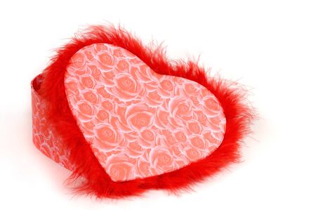 Lovely heart-shaped red fancy box isolated silhouette on white background. Valentine's Day gift conceptの写真素材