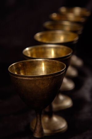 Antique decorative vintage silver stemware abstract close-up on black backgroundの写真素材