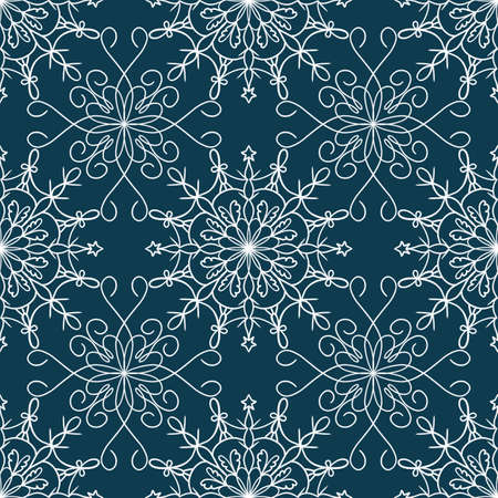 Tender winter seamless pattern with graphic snowflakes in blue and white colorsの写真素材