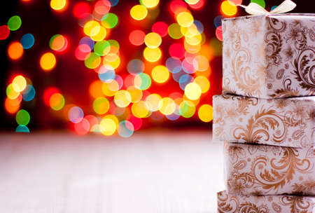 Magic Christmas gifts background of blurred lights