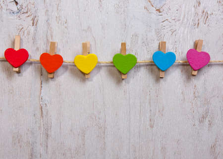 heart rainbow of colors on a white wooden background,LGBT symbolの写真素材