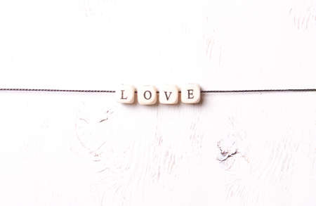 The word "Love" from cubes on a white background.concept Valentine's Dayの写真素材