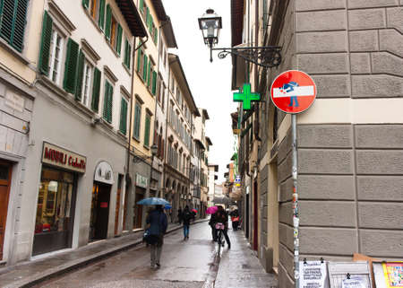 FLORENCE, ITALY - FEBRUARY 06, 2017: The old medieval street in Firenze, after the rainのeditorial素材
