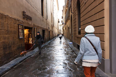 FLORENCE, ITALY - FEBRUARY 06, 2017: The old medieval street in Firenze, after the rainのeditorial素材