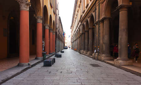 BOLOGNA, ITALY -FEBRUARY 08, 2017:old street with arches ,of Archiginnasio palace , University of Bolognaのeditorial素材