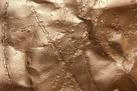 Old, gold background, bronze, paint in the cracks, vintage textureの写真素材