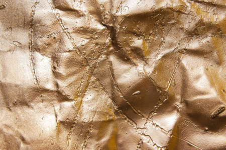 Old, gold background, bronze, paint in the cracks, vintage textureの写真素材