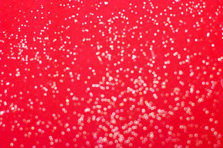 Red, abstract background with white defocused , bokeh light