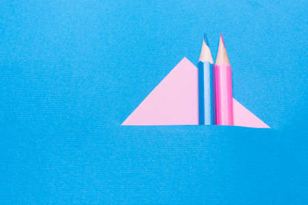 The pink and blue pencils on paper, the concept of minimalism