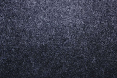 Horizontal dark gray felted warm texture. Soft wool fabric.minimal copy spaceの写真素材