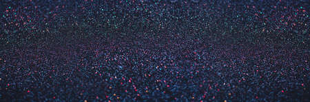 Dark colorful blue blurred background of glitter, festive, Christmas, New Year. Lights like stars in the skyの写真素材