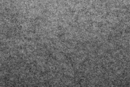 Horizontal dark gray felted warm texture. Soft wool fabric.minimal copy spaceの写真素材