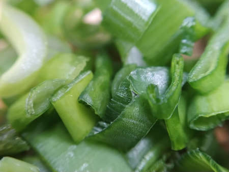 Sliced green onions, macro photoの写真素材