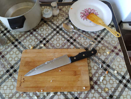 Disorder on the kitchen table after cooking