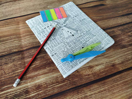 School supplies on a wooden tableの写真素材