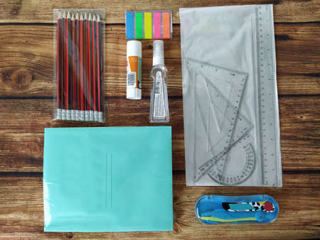 School supplies on a wooden table