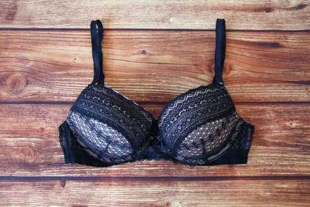 Black bra the wooden background with a copy spaceの写真素材