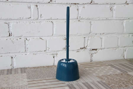 Toilet brush on a tableの写真素材