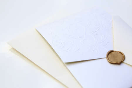 Decorative wedding invite isolated over a white backgroundの写真素材