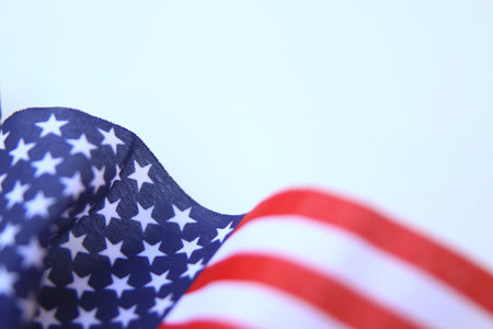 American flag U.S. Flag blowing in a strong wind isolatedの写真素材