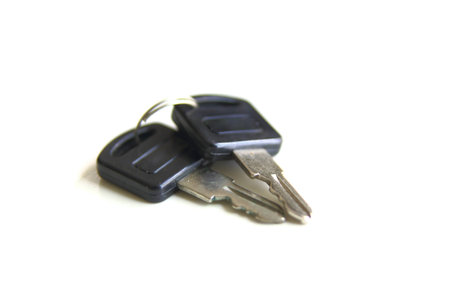 Set of door keys isolated on white backgroundの写真素材