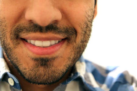 Closeup of beard man smiling, bright white Teeth