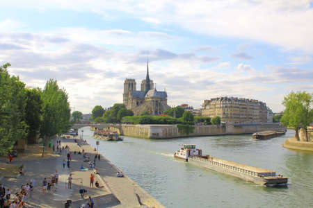 Notre Dame Cathedral with Paris cityscape panorama during summer time, France.のeditorial素材