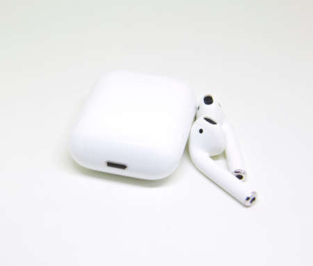 Miami, USA - FEBRUARY 6, 2018: AirPods wireless bluetooth headphones developed by Apple Inc.