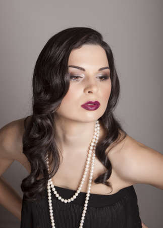 beauty portrait young woman with black long shiny hairの写真素材