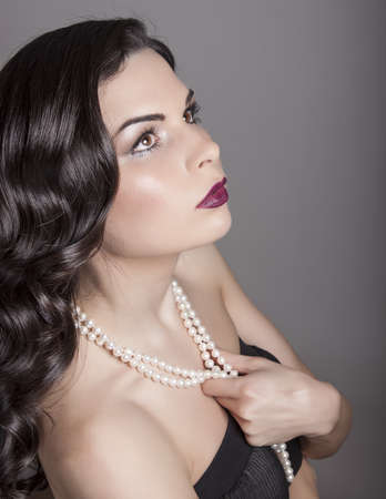 beauty portrait young woman with black long shiny hair