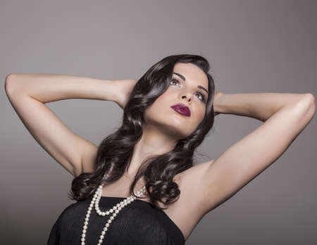 beauty portrait young woman with black long shiny hairの写真素材