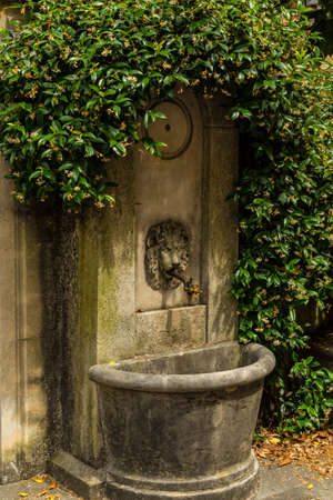 Old style drinking fountain at the Como, Italyの写真素材
