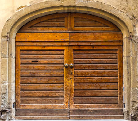An old wooden doors, element of Italian architectureの写真素材