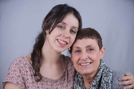 The portrait of a happy mother and daughter