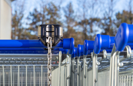 many trolley shopping cart with coin lock anti theft systemの写真素材