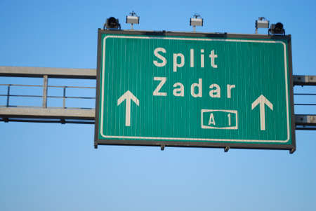 Highway traffic sign in Croatia, Europe, indicating Split and Zadarの写真素材