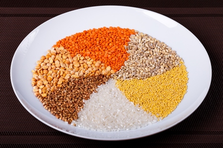 Twisted cereals: pea lentil wheat millet rice buckwheat closeupの写真素材