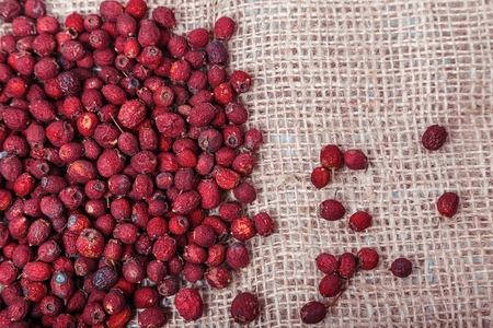 Dried fruits and berries on sacking backgroundの写真素材