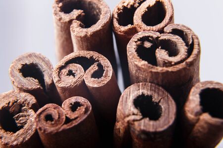Cinnamon sticks canella on white background close-up macro
