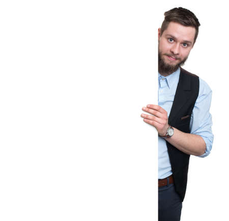 businessman holding a white panel and gesturing isolated on white backgroundの写真素材