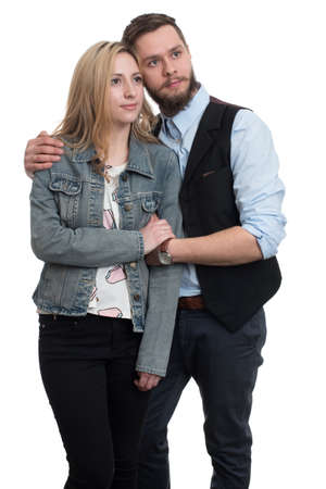 Portrait Of Young Couple Hugging Isolated On White Backgroundの写真素材