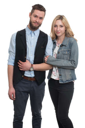 Portrait Of Young Couple Hugging Isolated On White Backgroundの写真素材