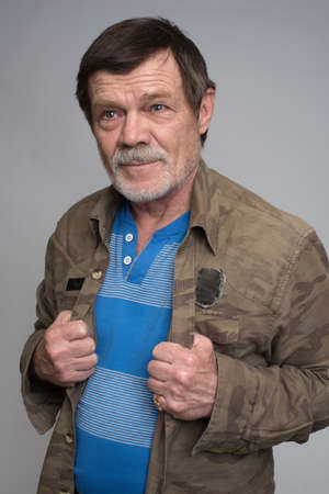 middle-aged man dressed in a gray jacket isolated onの写真素材