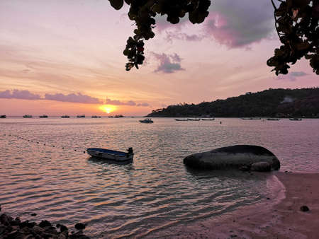 Boats on the sea during sunset - Ao Chalok Ban Kao beach, Koh Tao, Thailandの写真素材