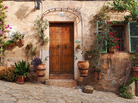 Wooden door in the old townの写真素材