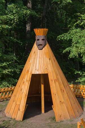 children's wooden house. Imitation Indian tepeeの写真素材