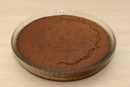 freshly baked cake in the shape of the glass on the tableの写真素材