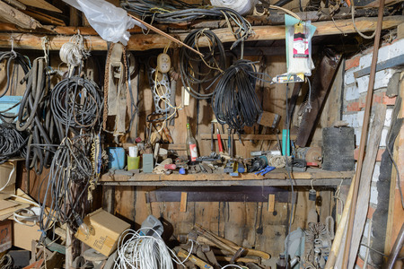 pile of tools and various items in the workshopのeditorial素材