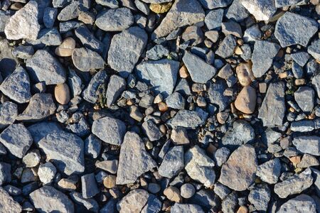 scattering of small stones on the groundの写真素材